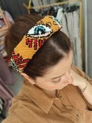 “The Eye” Punch Taç